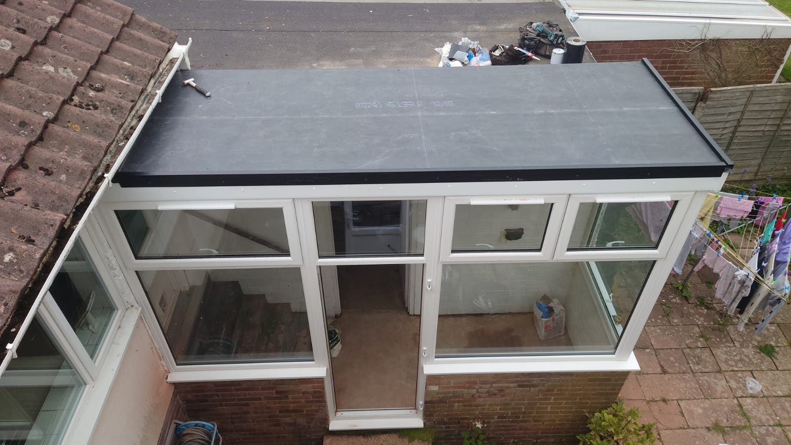 Durable EPDM flat roofing installed on a Maidstone conservatory, enhancing weather resistance and style