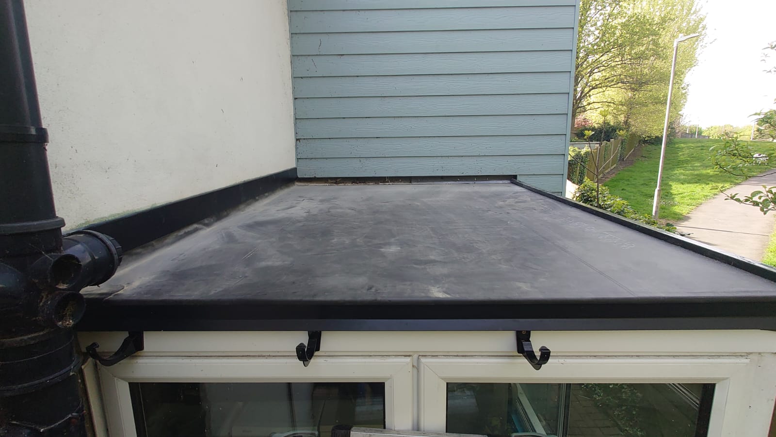 Simple flat roof EPDM over extension
