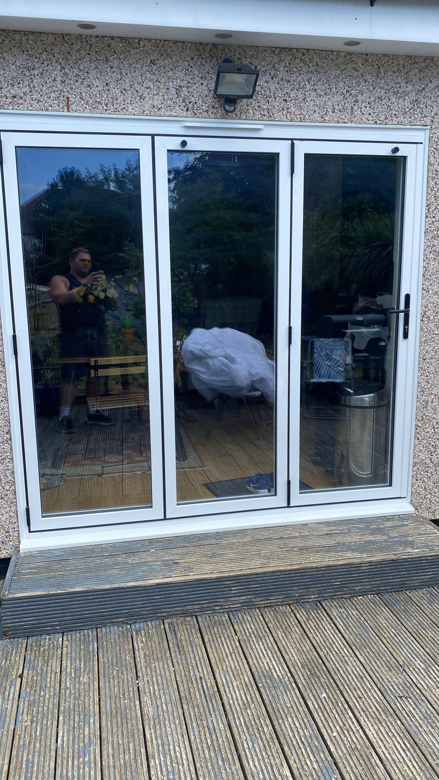 Folding UPVC windows onto patio